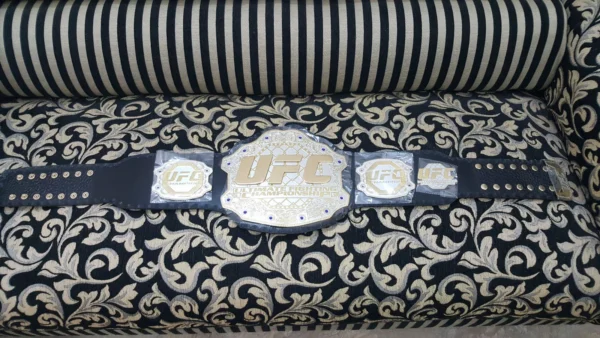 iconic UFC gold raised by Jon Jones