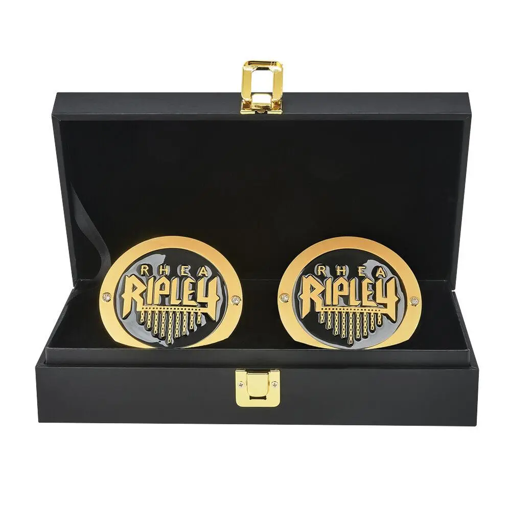 Rhea Ripley NXT UK side plates replica box set featuring gothic crest and enamel detail
